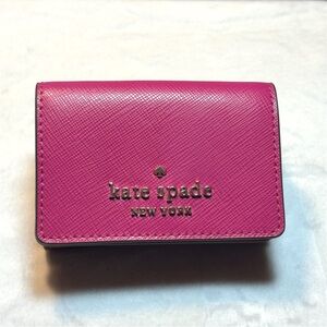 This pink leather wallet is a Kate Spade New York Staci Micro Tri-Fold Wallet 💳💄
